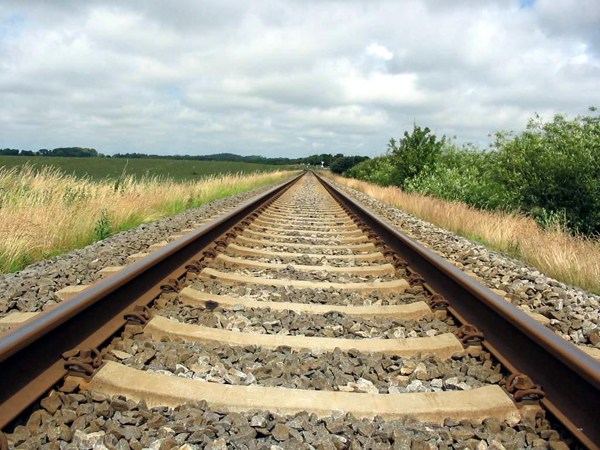 Railroad tracks illustrating article by Richard Klass about New York’s Labor Law Section 240 known as the “ Scaffolding Law ” and legal malpractice.